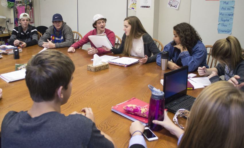 From left to right, Student Activities Committee seniors  Cal Nicholson,  Noah Parker, Mick Sullivan, Claire Foussard, Jonte Claiborne, and Chloe White sit as co-presidents Sullivan and Foussard discuss upcoming plans. 