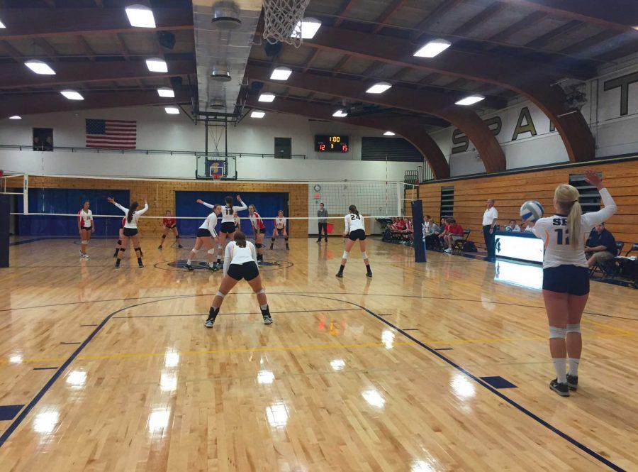 SET, SPIKE, HIT. The Varsity Volleyball team faces off against St. Croix Highschool.