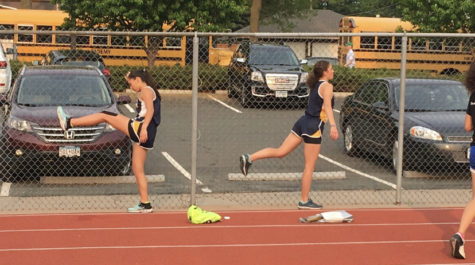 Senior Mia Schubert (left) has been the captain for the track team for 2 years now. 