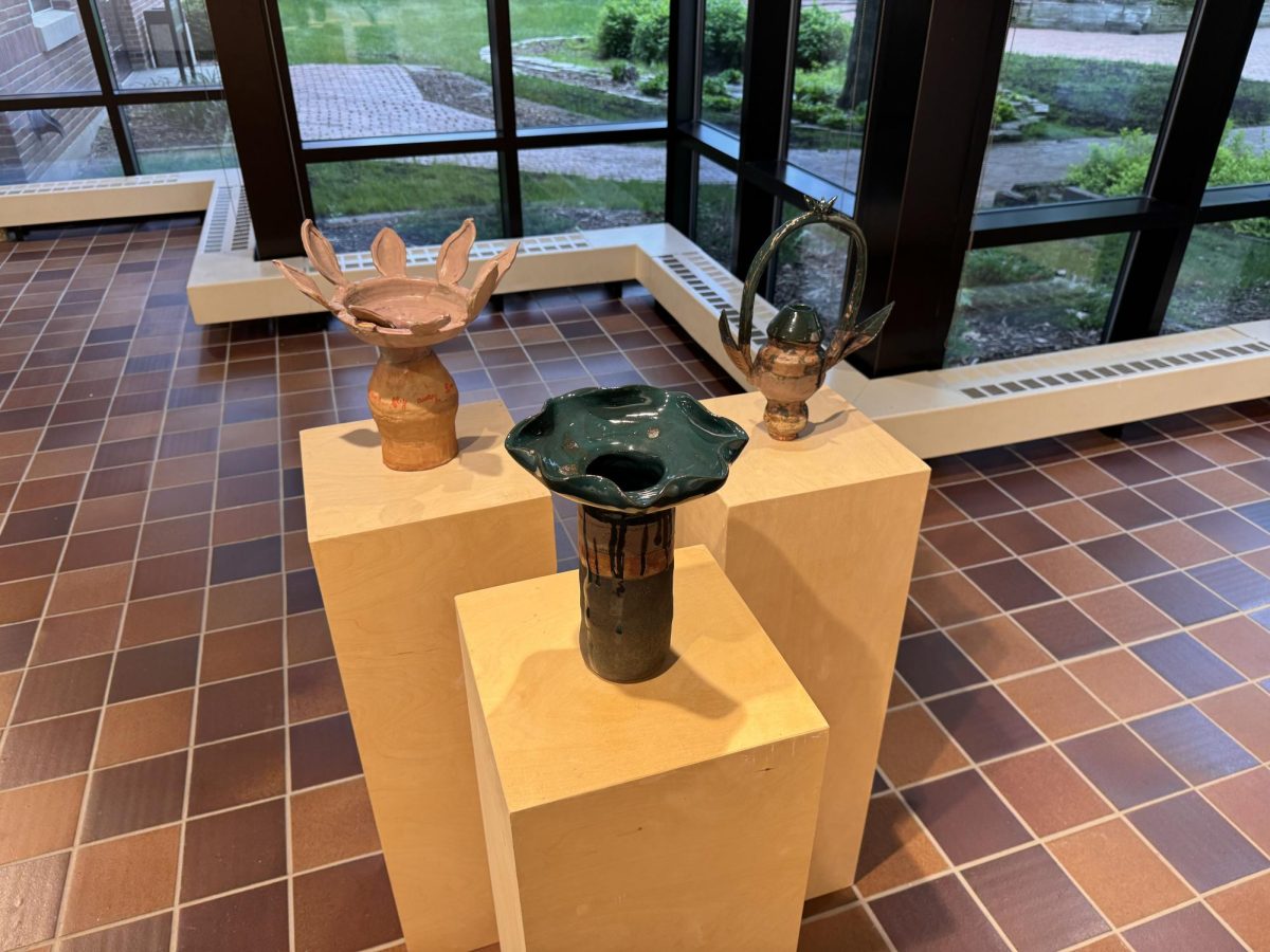 PRETTY PRESENTATIONS. Uniquely sculpted vases sit on pedestals in the center of the Drake Gallery.