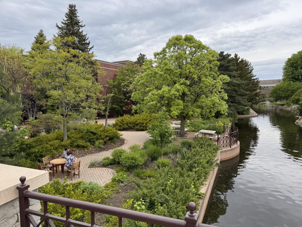 GET YOUR STEPS IN. Centennial Lakes Park offers swinging seats and benches facing the gorgeous waterway and gardens. 