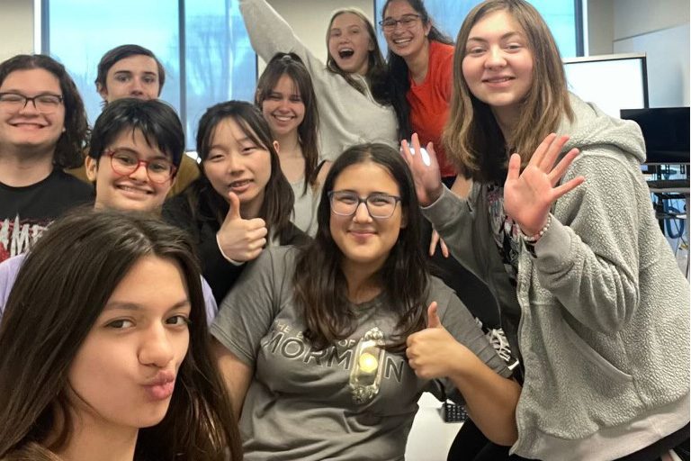 BOOKS UNITE. Book Club members come together in the math classroom to celebrate the class of 2024 before senior projects. Junior Grace Medrano said, We [Medrano and Raven Glaser] took over last month [as the new leaders], so we’ll be running it next year. (Submitted photo by Grace Medrano) 