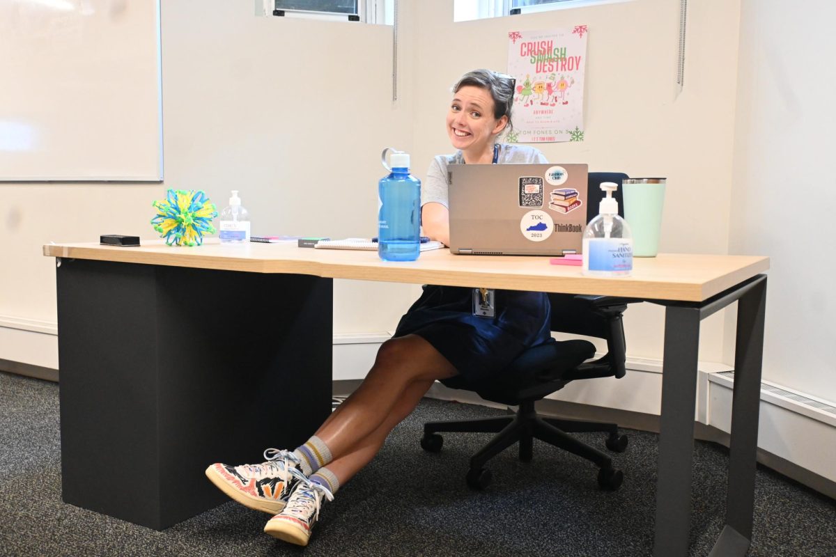 NEW YEAR, NEW SHOES. Director of Speech and Debate Marit Warren's highlight of her first day outfit is her shoes. "It just looks like someone had a lot of fun making them, it's kind of the shoe I would have designed in sixth grade," Warren said.