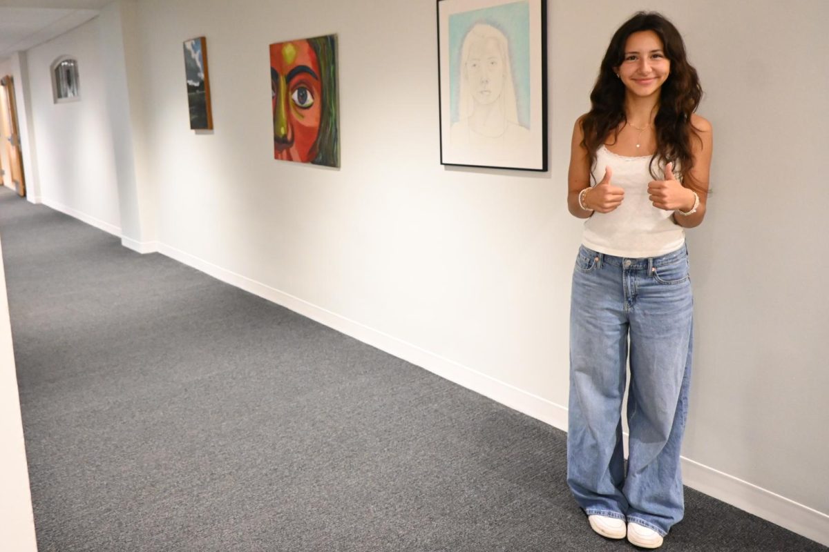 CUTE MEETS COMFORT. Junior Paloma Gomez-Whitney dons new jeans and a well-loved white tank top. But the star of the show are Gomez-Whitney's nails. "I did get these for the first day of school. These were actually what I put the most effort into for my outfit."