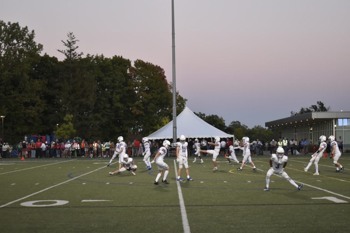 WARM UP. The Wolfpack prepares for the annual Homecoming football game. All players were dialed in to the warm up, and they were ready to put on a show. 