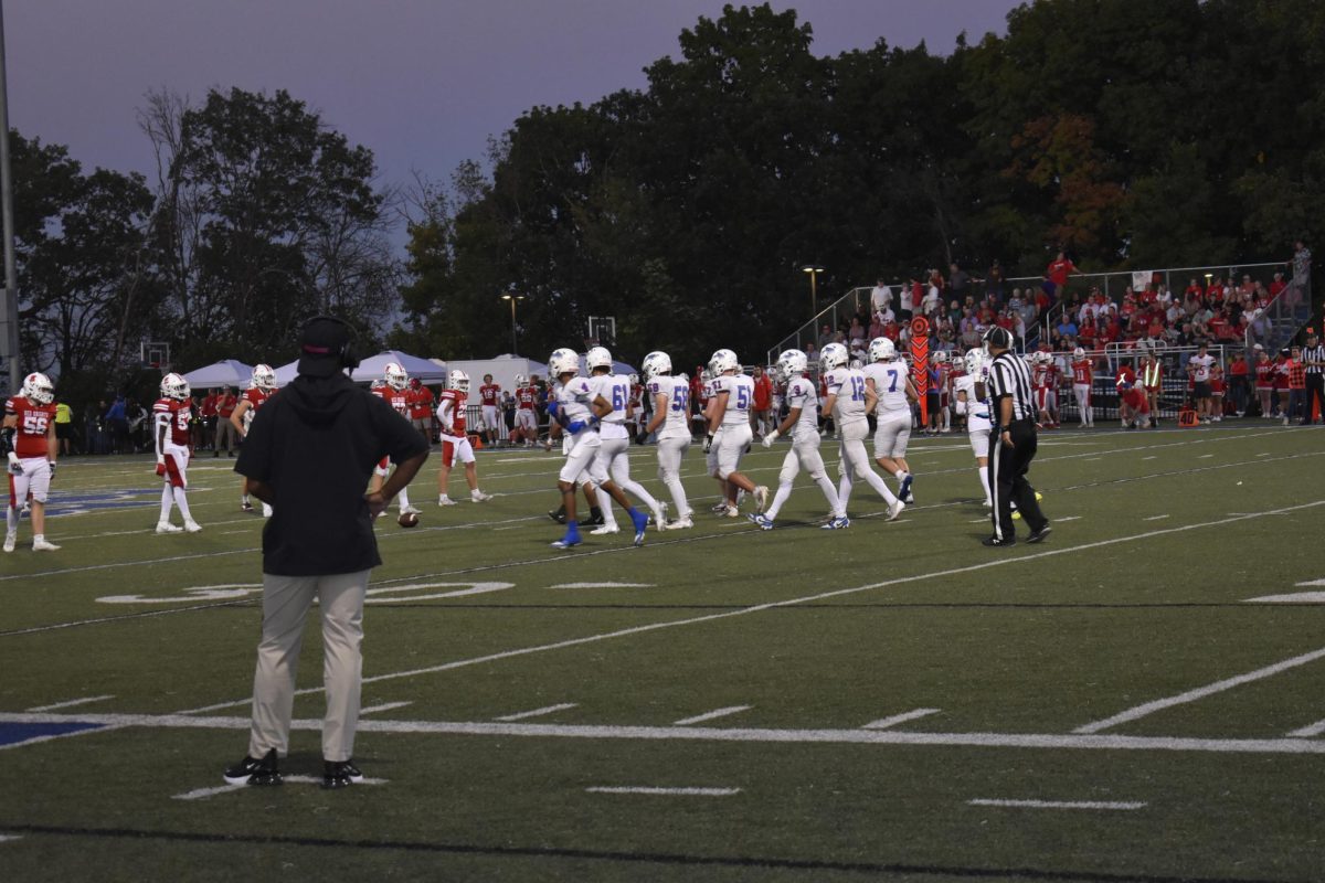 LINE UP. The Wolfpack prepares to run their play.