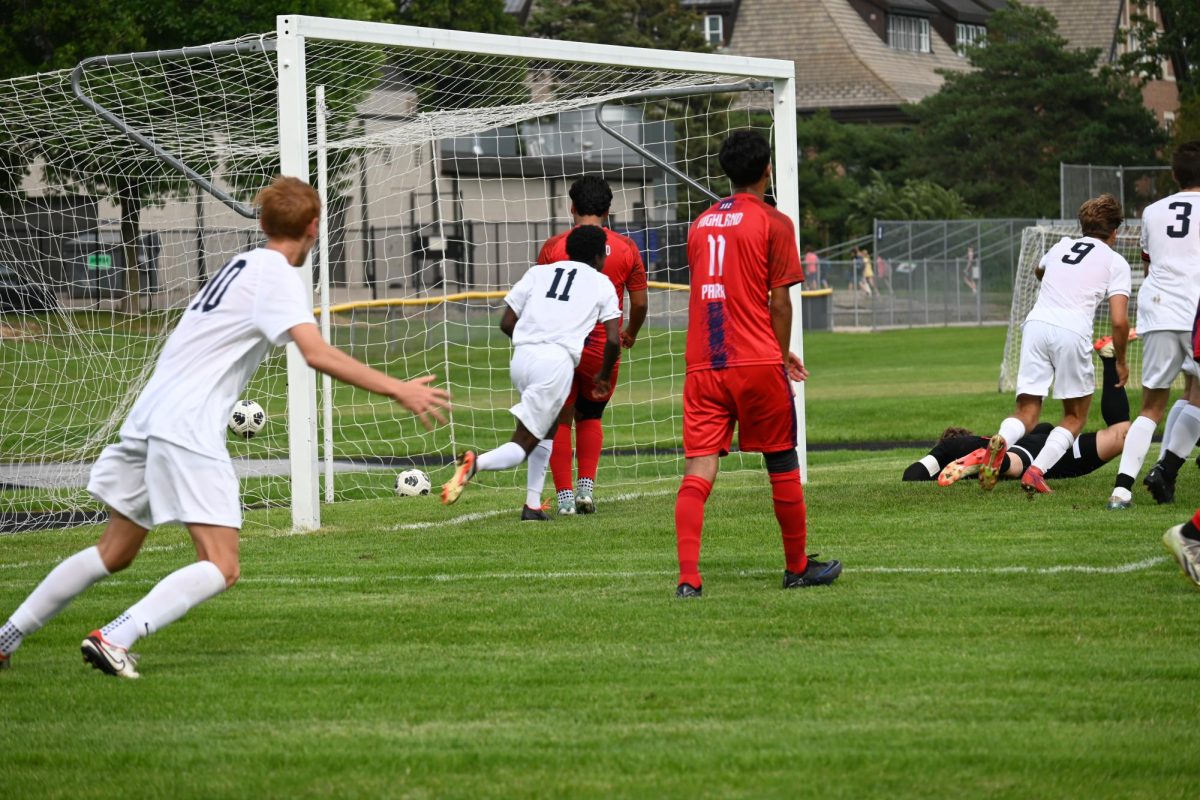 GOAL. Spartans run to celebrate their first goal as the ball hits the back of the net.