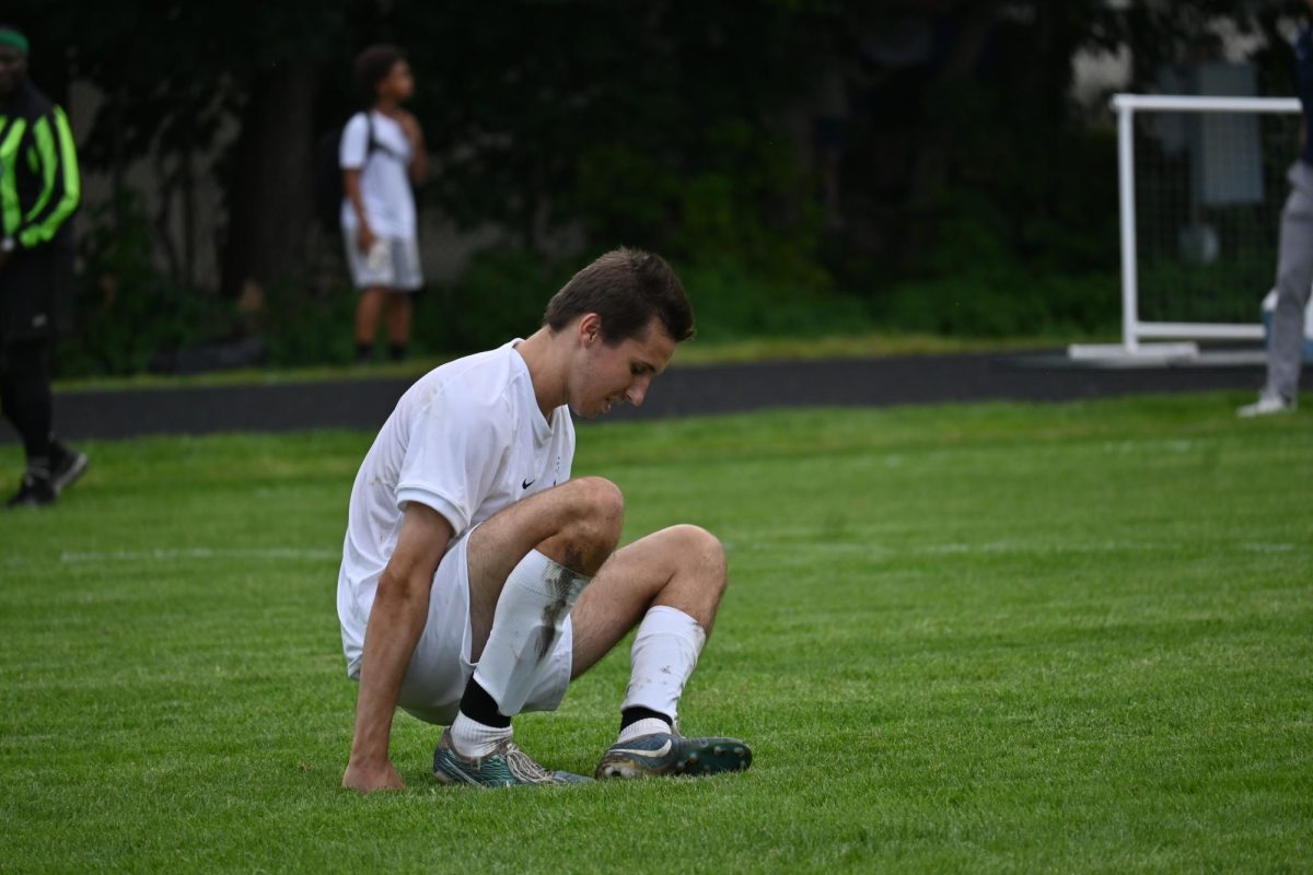 PERSEVERANCE. Sullivan gets up from the ground slowly after getting kicked in the shin.