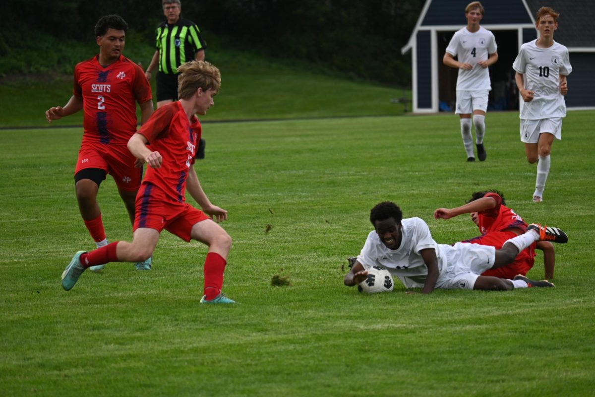 BLOCKED. Straub's offensive attempt is stopped by a slide tackle from the opposing defense.