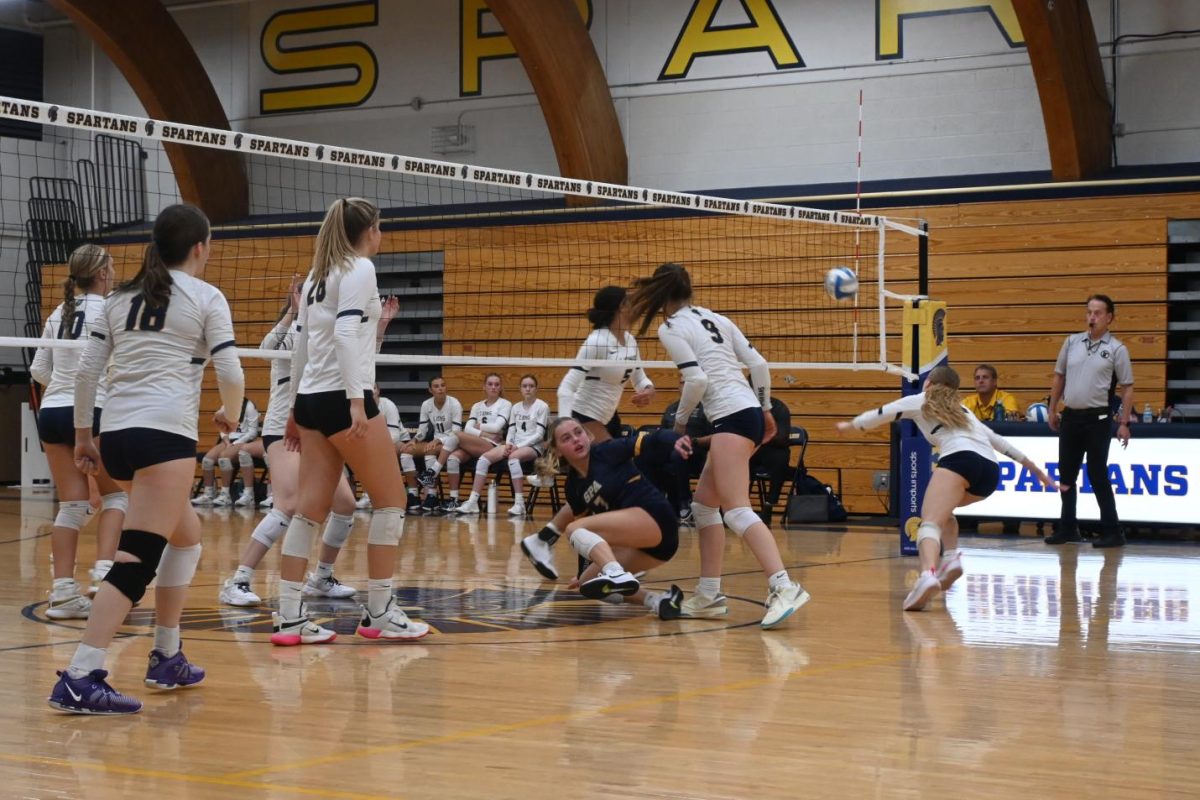 GET IT UP. Spartans Volleyball scrambles to get the ball up in a point against Providence Academy. The team lost against them 3-0 last week at Providence and rematched them this wednesday at home.