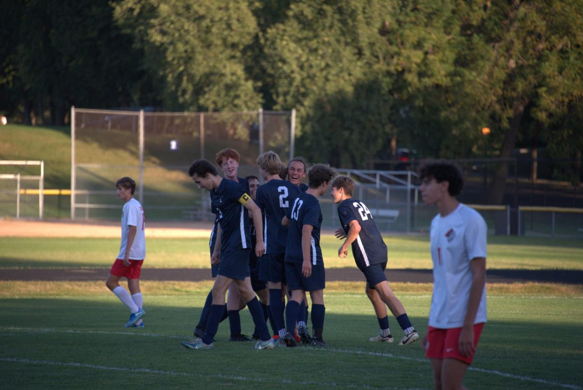 LET'S GO. The team groups up to celebrate a goal. 