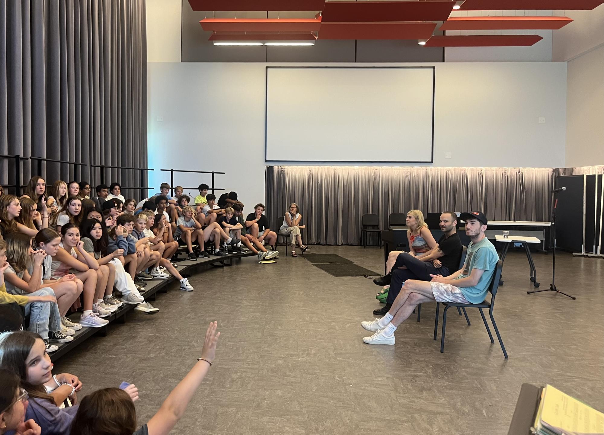 ANSWERING QUESTIONS. Charly Bliss responds to students inquires about all aspects of their lives, making connections with the middle school singers. 