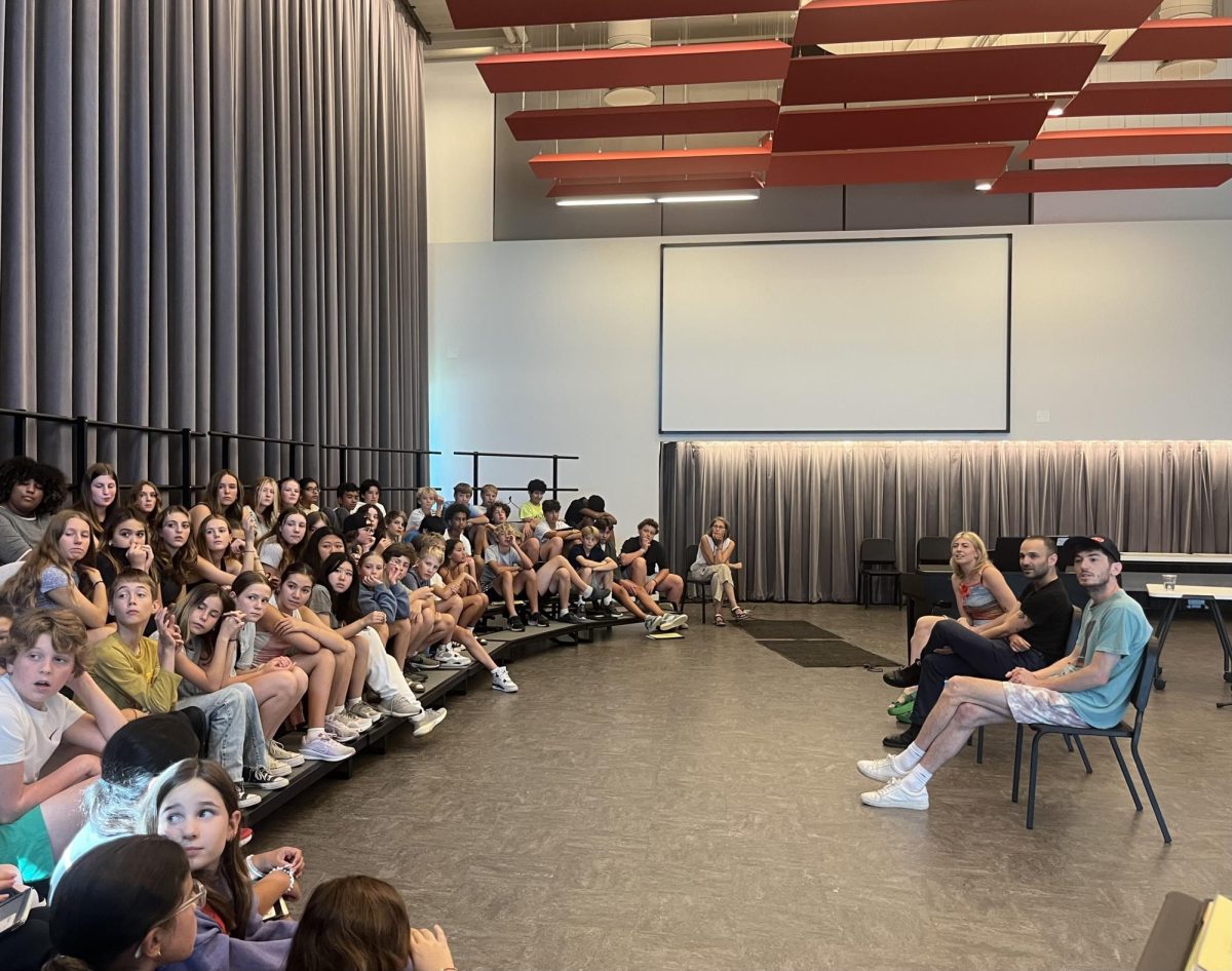 ANSWERING QUESTIONS. Charly Bliss responds to students inquires about all aspects of their lives, making connections with the middle school singers. 