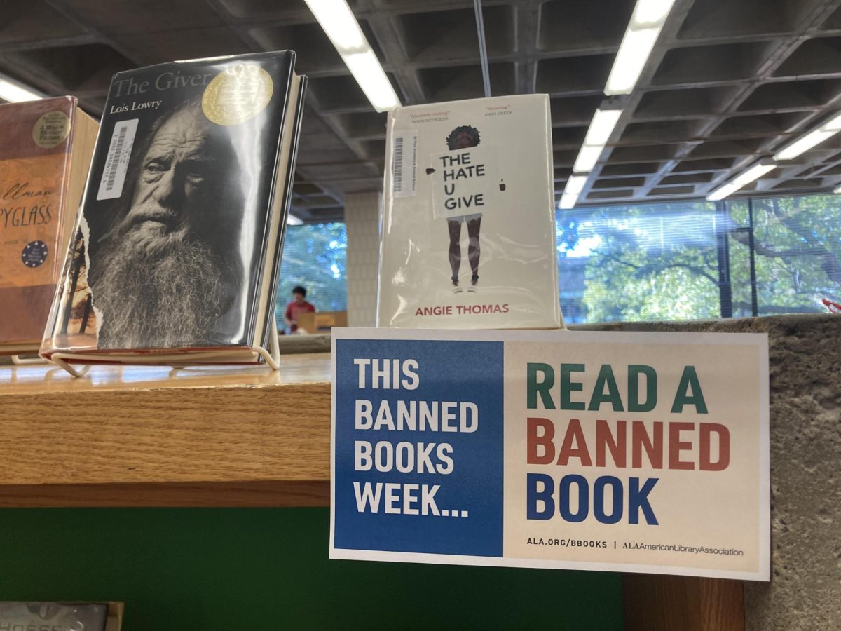 PLAIN AND SIMPLE. A cutout by the display urges students to read banned books.