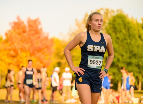 RACE READY. Junior Maren Overgaard uses mantras or little phrases to keep her going when running. "I like to repeat little things in my head, because I get really focused on splits, where I am in the race and who's next to me and all that stuff," she said. The term "splits" refers to the time it takes a runner to complete a specific distance within a race. (SPA SmugMug).