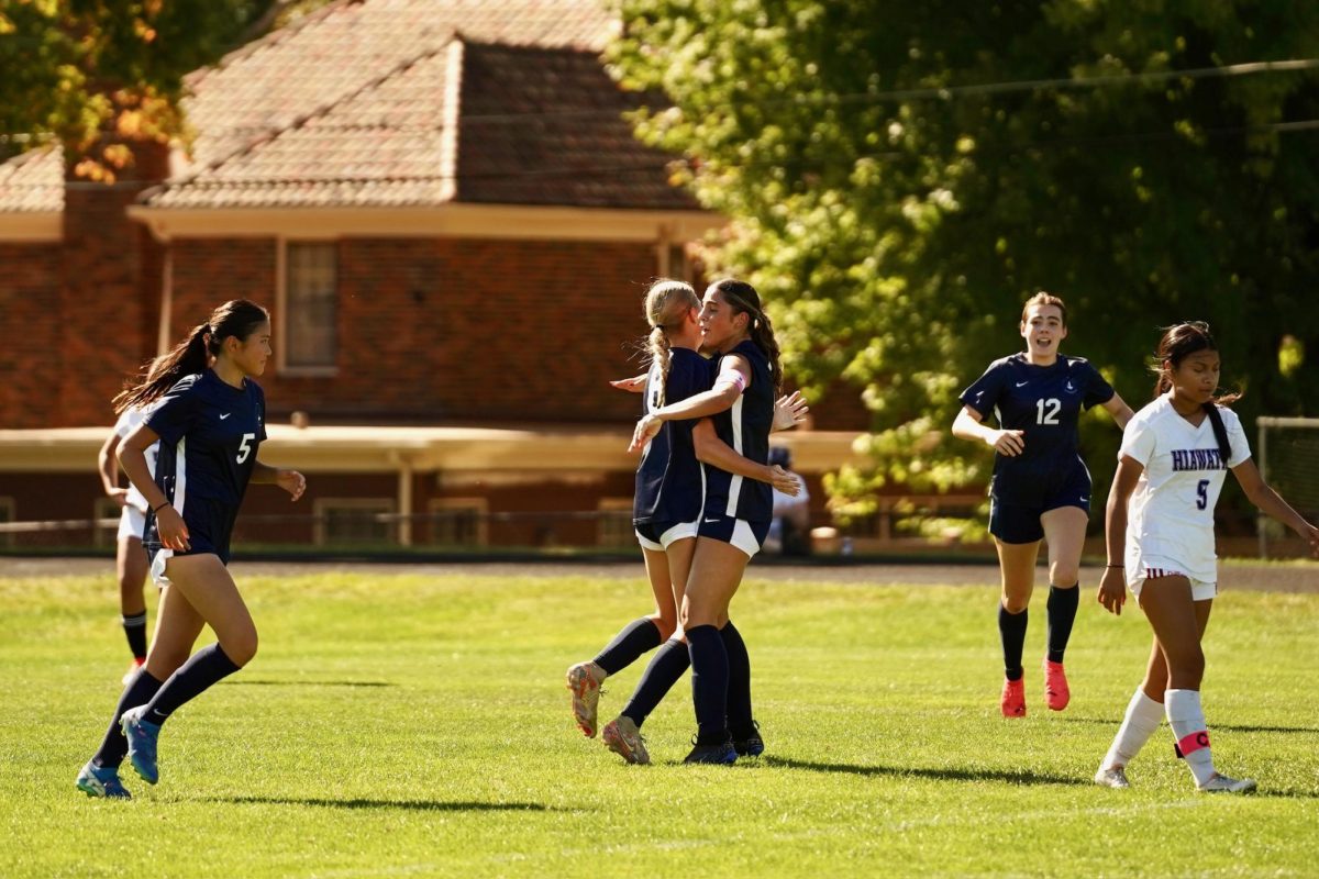 CELEBRATION. Forward Maggie Sampsell-Jones and Center Midfielder Lucia Gonzalez celebrate after Sampsell-Jones scored a goal.