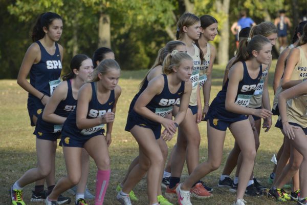 READY TO GO. Seconds before the girls race begins, the team gets in position to race.