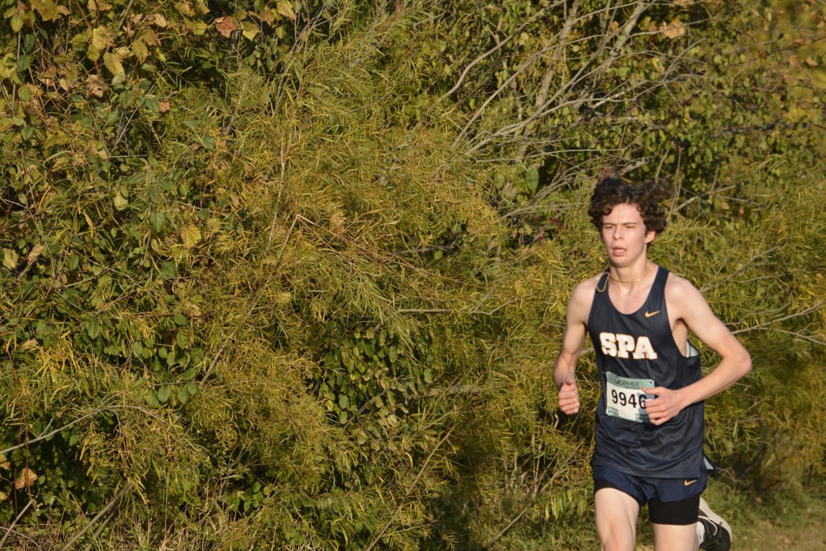 STAY IN CONTROL. Senior Isidor Valdez keeps strong as he runs through the course.