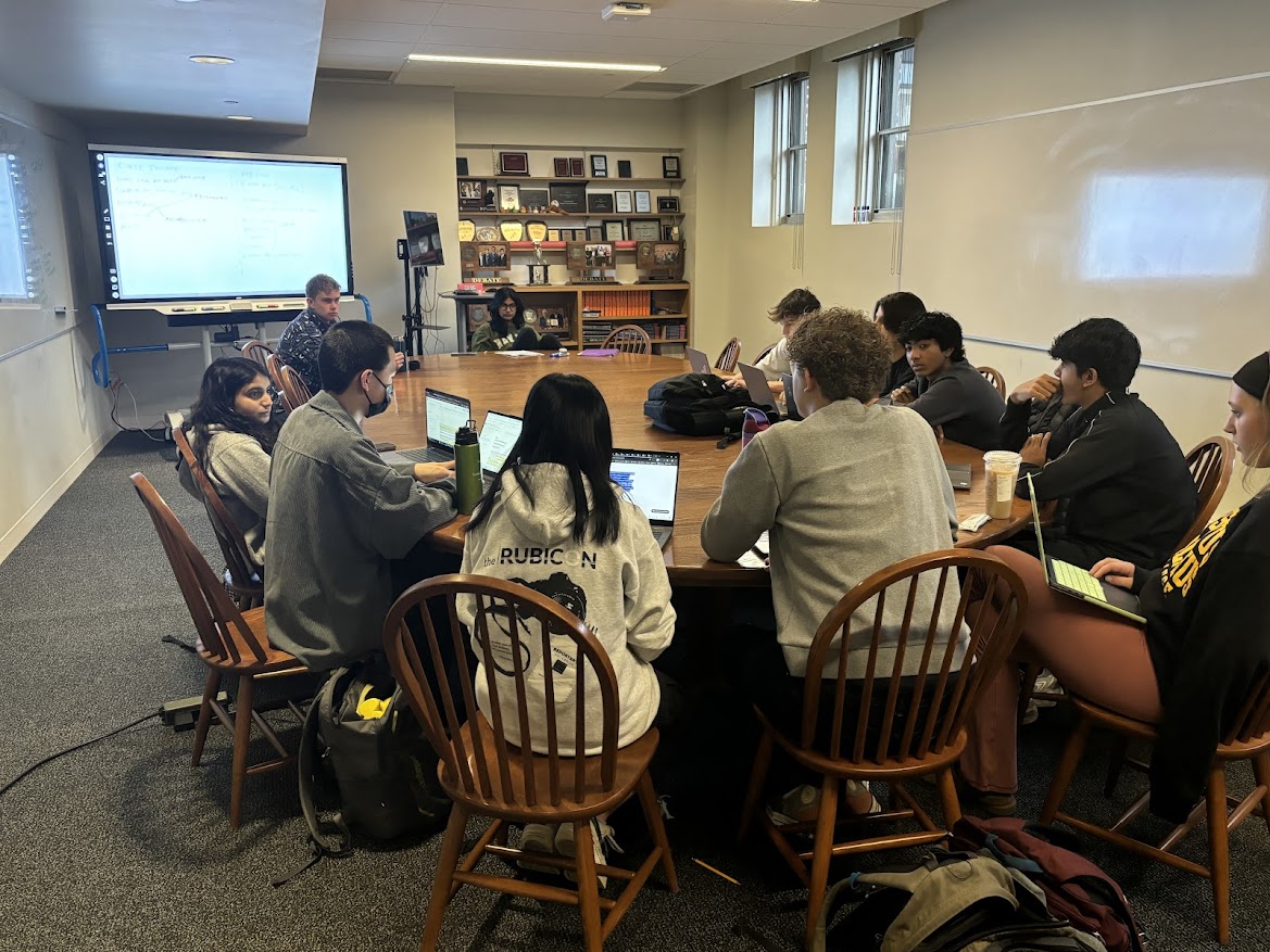 Debate preparation on Wednesday October 21, 2024, for upcoming tournaments. Captains David Schumacher and Cerena Karmaliani led the practice.