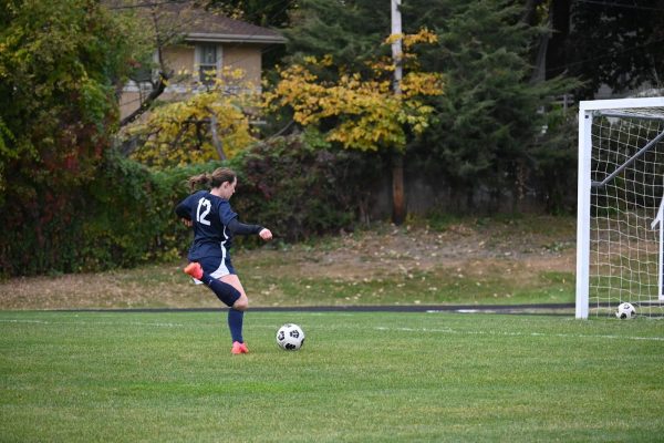 GO-AHEAD GOAL: Junior Clare Ryan-Bradley (‘26) finds herself in space yet again, this time alone against the keeper, and slots one into the bottom-left corner to put the Spartans up 1-0.