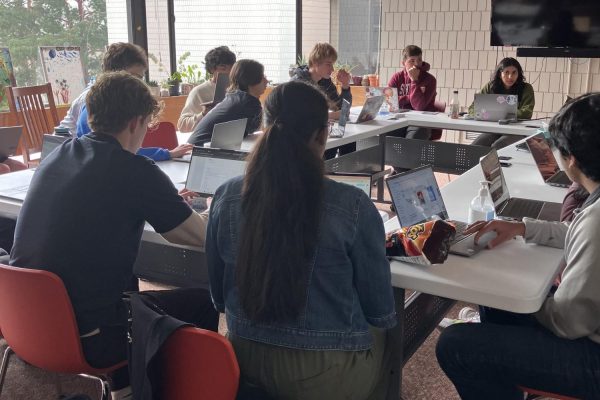 STUDENT VOICE. The Upper School Council presidents share the agenda at a recent bi-weekly meeting. Elected councils meet on Mondays, but USC subcommittees may meet more frequently to achieve their goals.