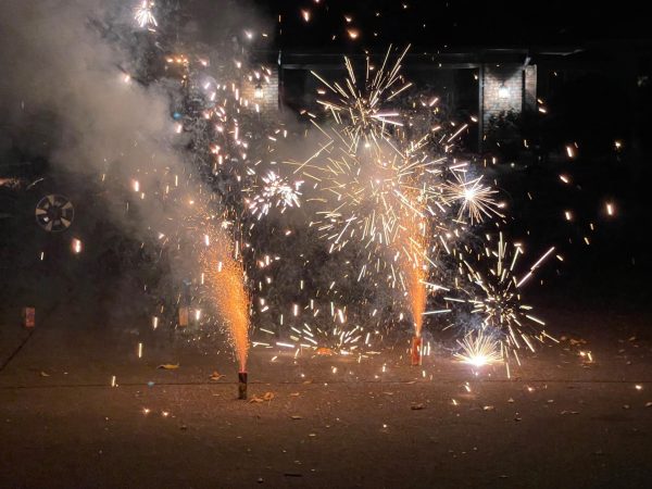 FIREWORKS. Traditional Diwali fireworks explode at night to honor light over darkness as the celebration commences.