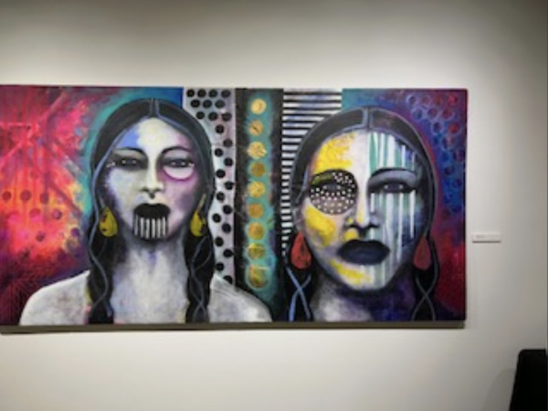 READY FOR WAR. "Sisters IV" displays two warriors standing proudly after battle, this further exemplifies the theme of empowering women in her exhibit