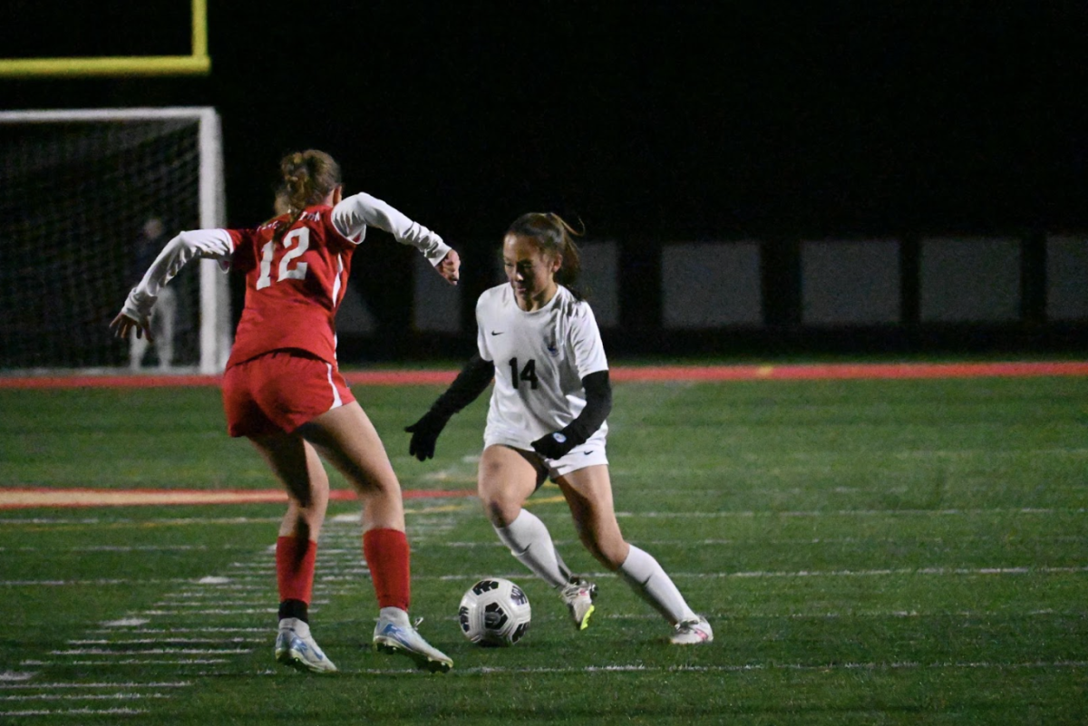 SUPERB SKILL. Kate Tuttle takes on a Visitation defender, easily moving past with a stepover. As the game got closer and closer to halftime, the Spartans began to look even more comfortable with their 1-0 lead, continuing to push forward and attack.