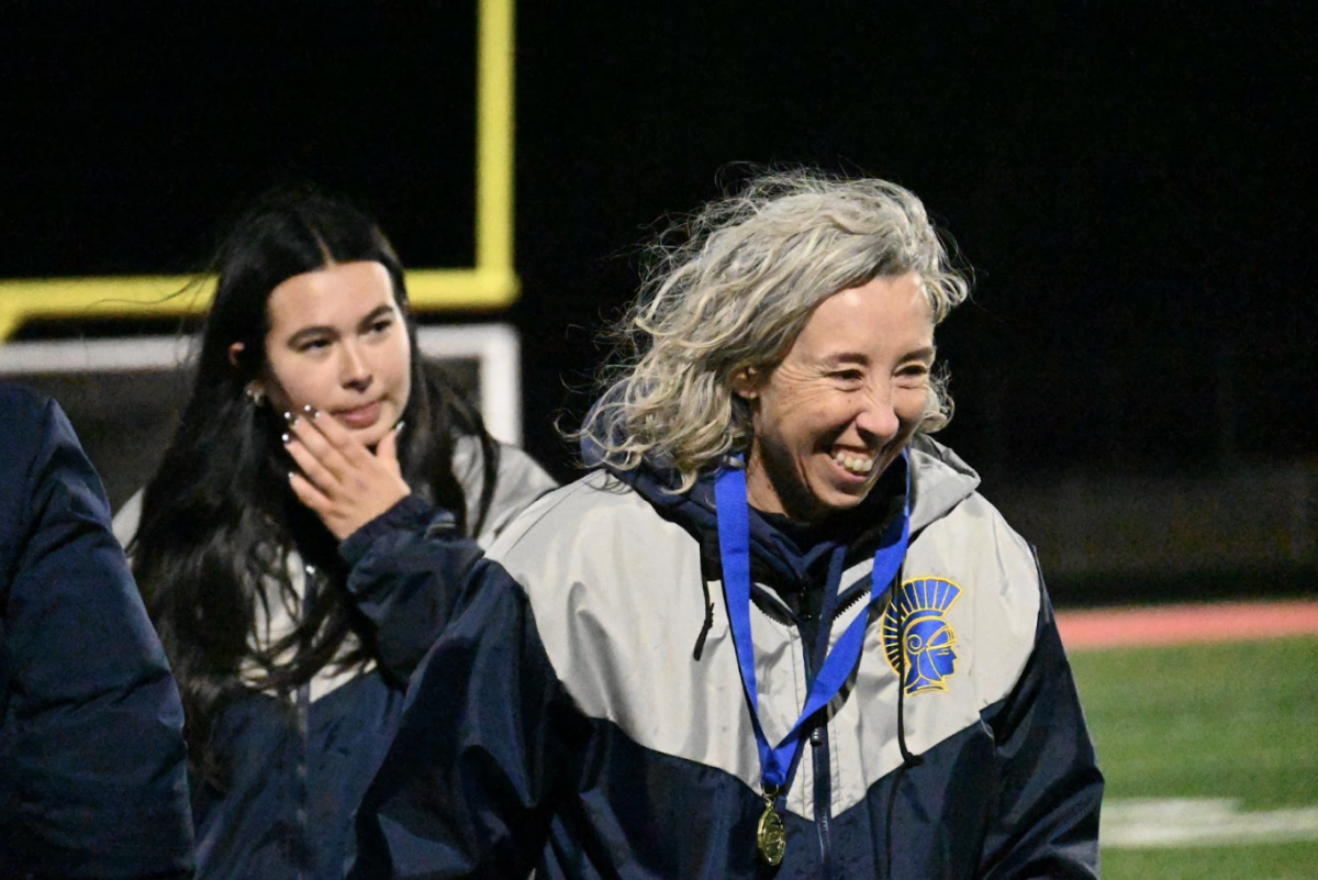 COACHING CHEER. GVS head coach Aileen Guiney celebrates with her medal as the Spartans are officially awarded the title of Section 3A champions.