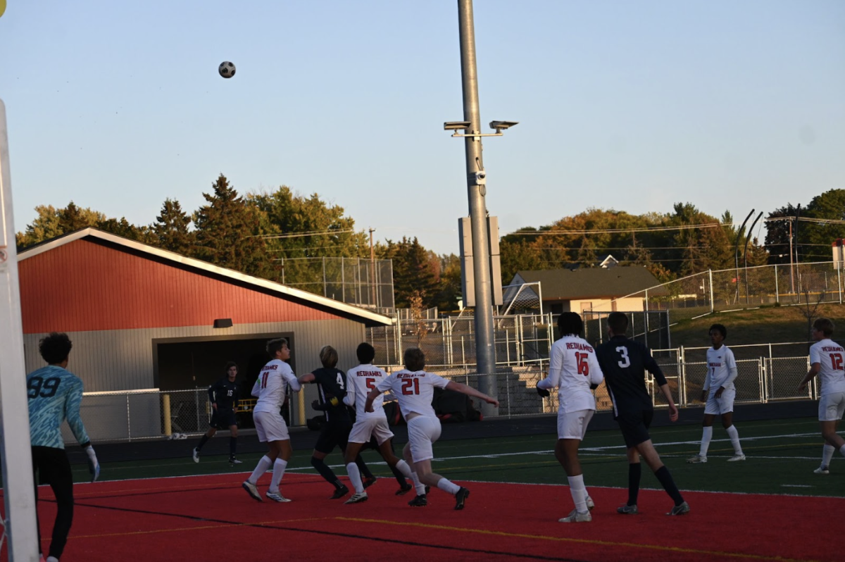 FLYING HIGH. Lucas Granja tosses a throw-in up into the air, arcing towards the corner of the six-yard box.