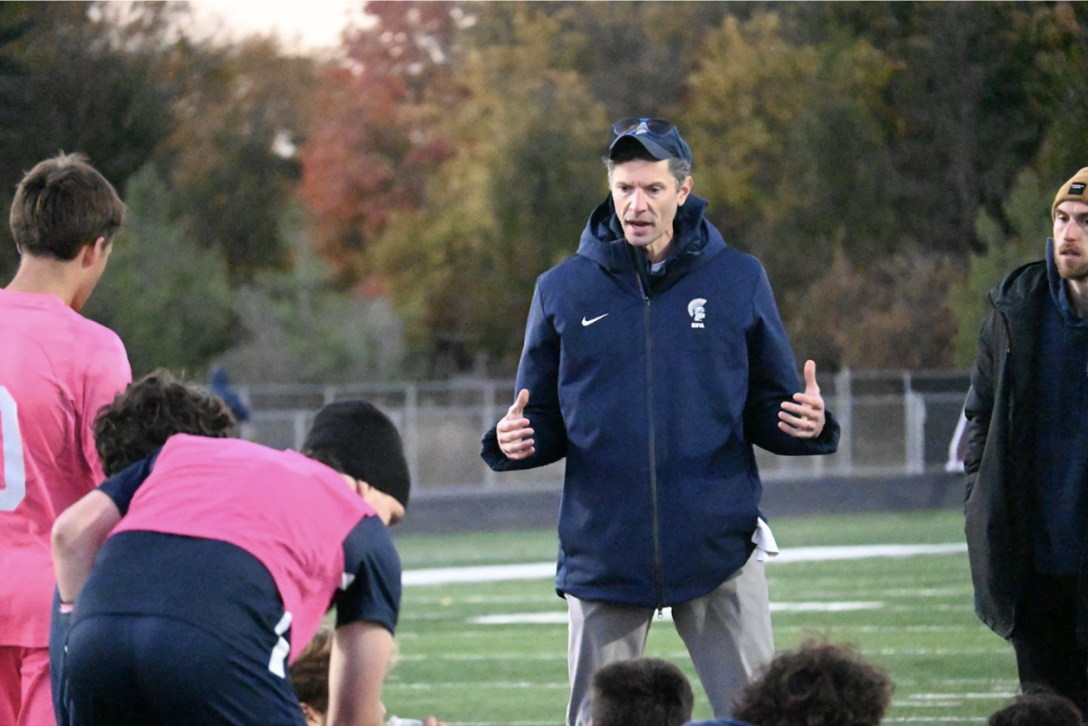 TACTICAL TALK. At halftime, BVS head coach Max Lipset, also an SPA alumn, walks the team through their first half performance. After a scoreless first half, the Spartans were ready to get the opening goal of the game and came back to the field driven by Lipset’s halftime speech.