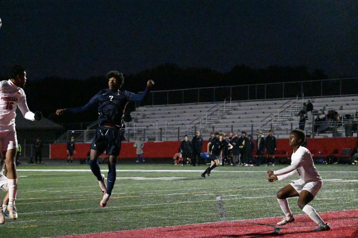 HIGH HEADER. Mas Kouakou leaps up for the ball and headers it past the keeper into the left side of the net. Kouakou’s goal, assisted by sophomore Kiki Sullivan, put the Spartans up 1-0 with only a bit of time remaining in the second half.