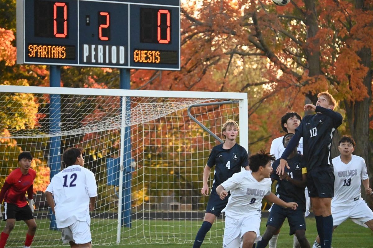 RISING UP. Freshman Graham Waibel (‘28) shoots up into the air as he attempts to win a header off of a cross into the box. BVS dominated the game in the air, winning many fifty-fifty balls and aerial duels throughout regulation, including two headers near the end of the second half that fell just off target.
