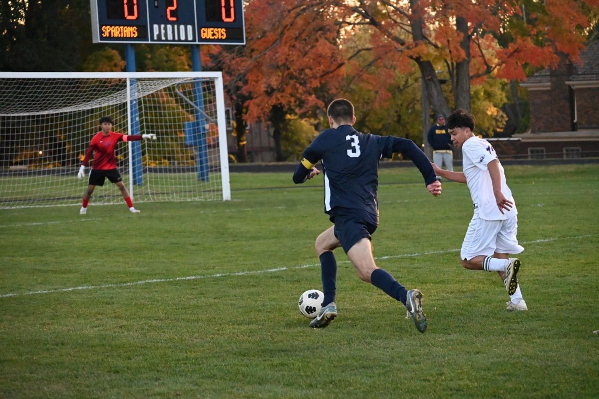 SPRINTING STRIDES. Senior Liam Sullivan (‘25) finds himself with yet another attacking opportunity just outside of the eighteen-yard box. As the end of the second half began to loom ever closer, the Spartans began to feel the pressure to get a game winner before the final whistle was blown.