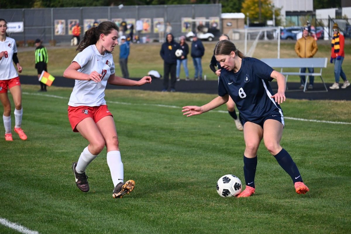 BREAKING THROUGH. Freshman Lucy Lowman (‘28) beats a defender in the corner. A relatively quiet second half led to the Spartans having only a few scoring chances, but more importantly, they were able to lock down on defense and pull off a shutout to secure the 1-0 win. Clare Ryan-Bradley’s (‘26) breakaway goal that gave the Spartans the lead advances them to the Section 3A final where they will face Visitation.
