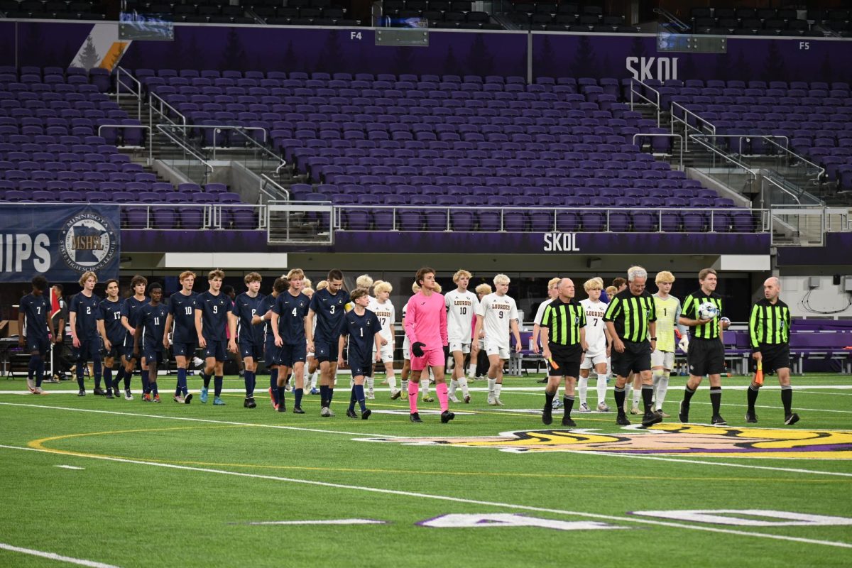 STOIC SILENCE. BVS walks out on the US Bank pitch for the sixth time in three years. They stride across the field so they can shake the hands of the opposing team before the match starts. The team is filled with many experienced players who have felt the nerves and victories that come with participating in the state tournament. 