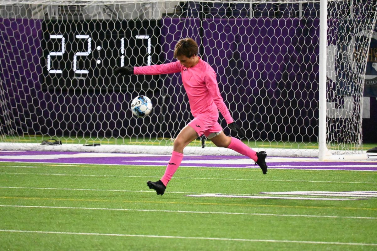 KEEPER CONSISTENCY. Sophomore Miles Vogenthaler drops the ball as he punts it. Vogenthaler was backup goalie, but he became BVS's starter after an early season injury. 