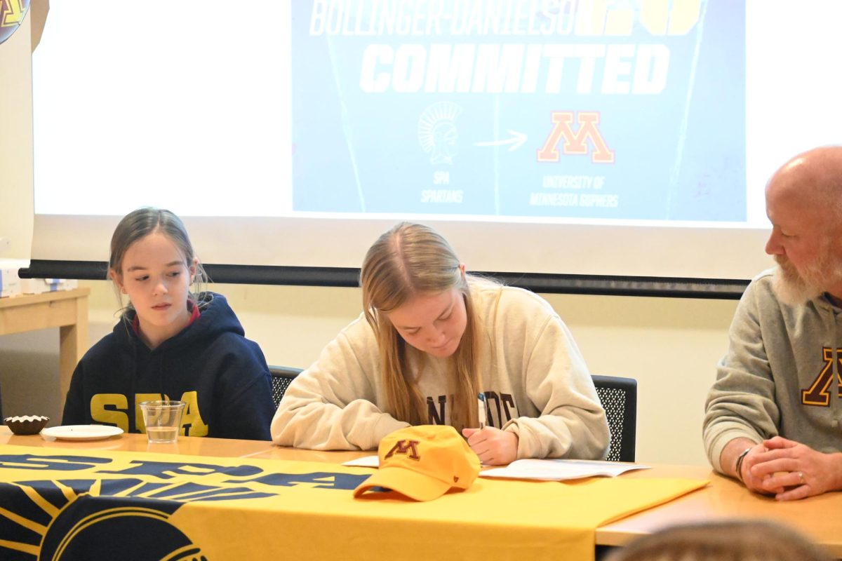 ITS OFFICIAL. Sawyer Bollinger Danielson signs her National Letter of Intent to play Division One soccer at the University of Minnesota.