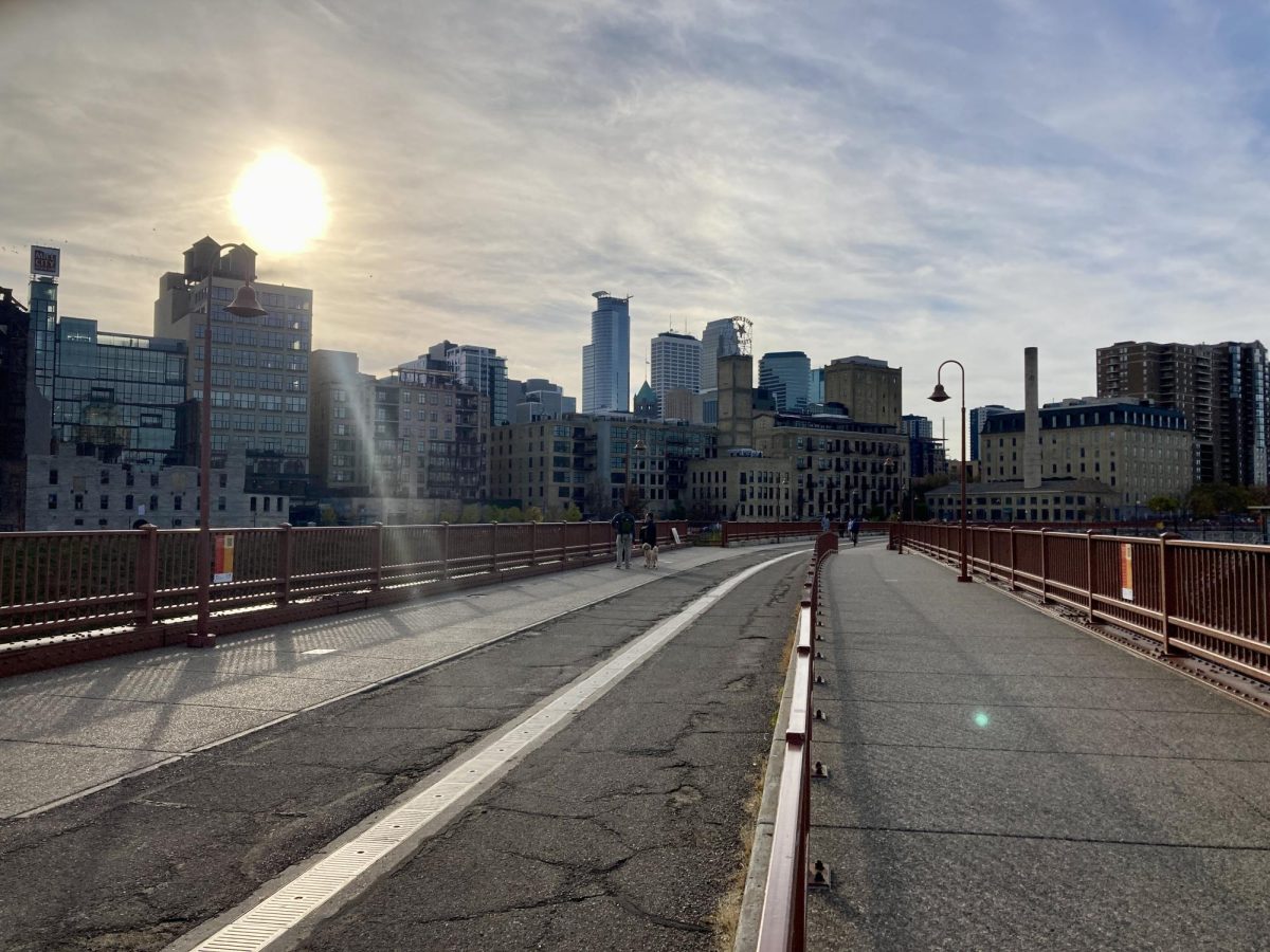 STONE ARCH BRIDGE. Signs four and five are located near the start of the bridge. From this point, visitors have a great view of the falls. 