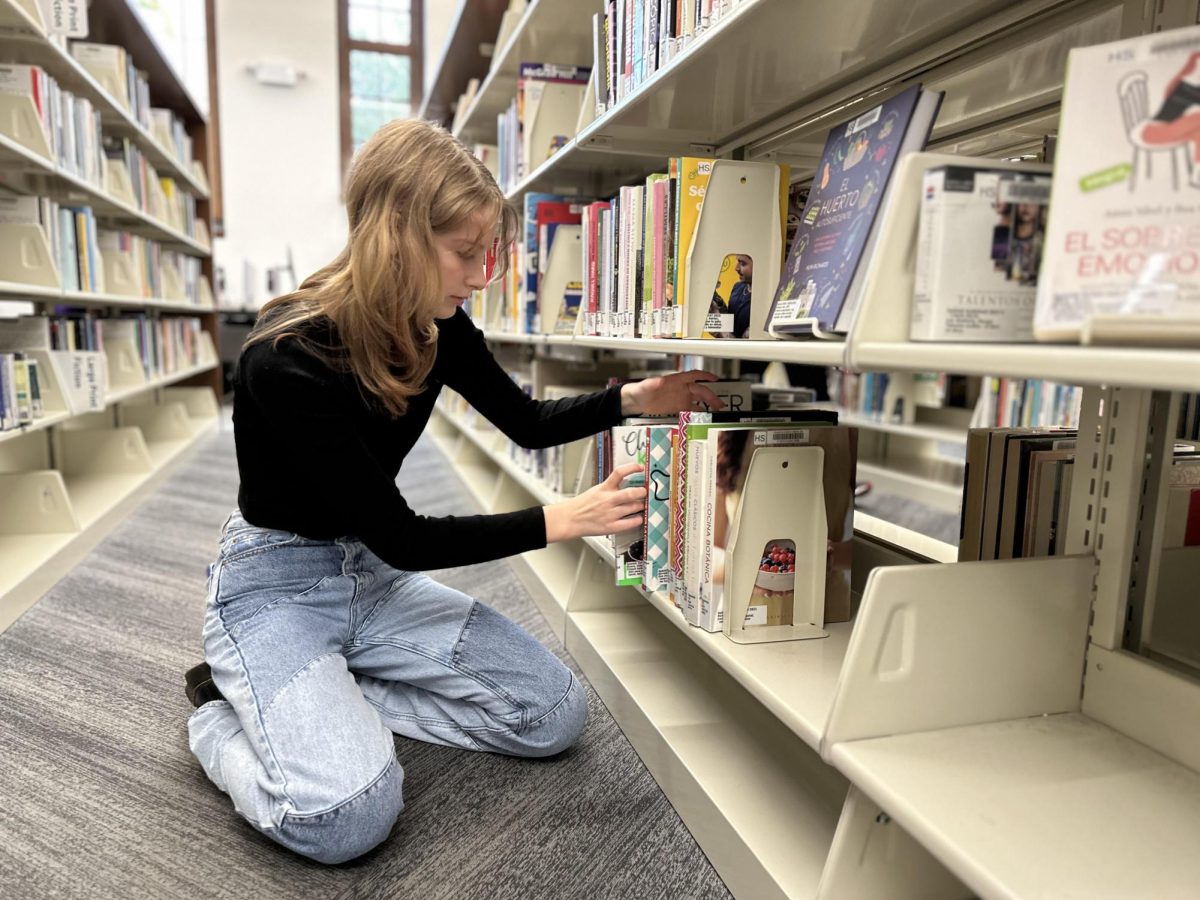 BACK ON THE SELF. At Hosmer library in Hennepin County, Campbell volunteers weekly and keeps the books in circulation, keeping them ready for people to check out. (Submitted by Via Campbell).