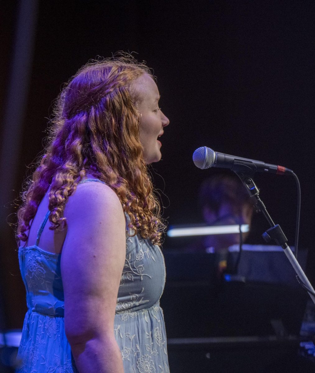 POWERFUL PERFORMANCE. Sophomore Johnson performs with the choir at the MS and US joint choral
performance. Johnson said. “I tried all the activities ... like, every sport under the sun ... theater just stuck out.